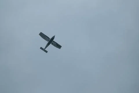 Plane alone in the sky Stock Photos