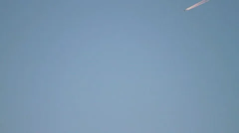 Plane and contrail 8419 Stock Footage 1091394