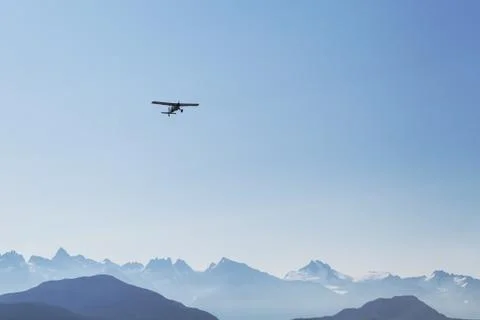 Plane and mountains Stock Photos