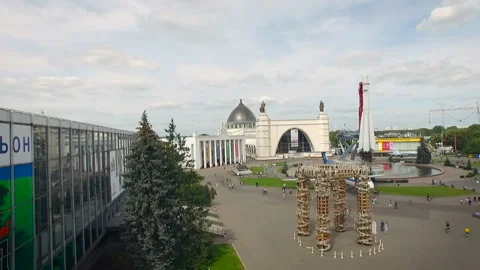 The plane and the rocket are standing in the center park. A lot of people are Stock Footage 93591611