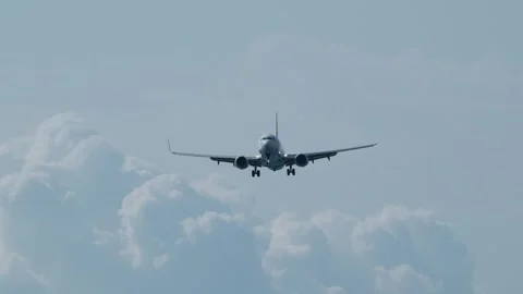 The plane approaching the airport. The plane is preparing to land. Stock Footage 313728728