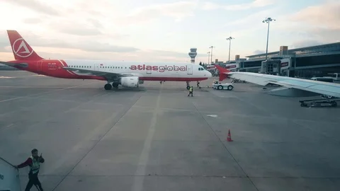 Plane Atlas Global moving backwards at Adnan Menderes Airport, Izmir Stock Footage 104409783