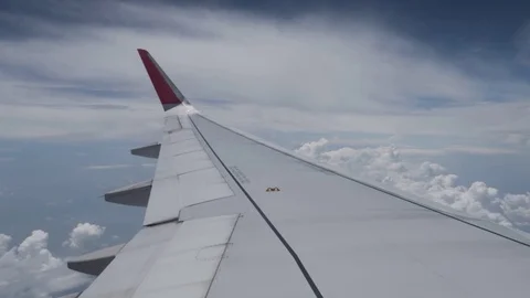 The plane is backing up the runway view from the porthole. Stock Footage 119711683