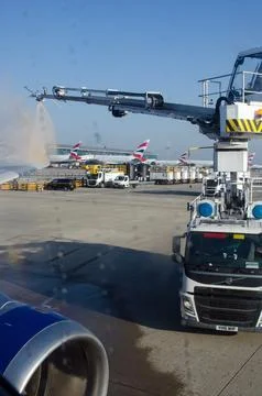 Plane being de-iced, Heathrow Airport, London Stock Photos