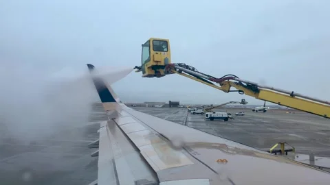 Plane being deiced at Salt Lake City, Utah Stock Footage 300166261