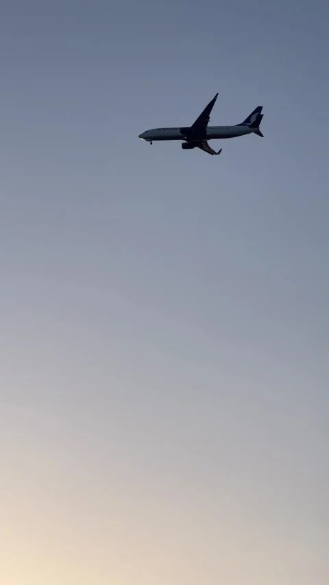 Plane in blue sky Stock Footage 337175058