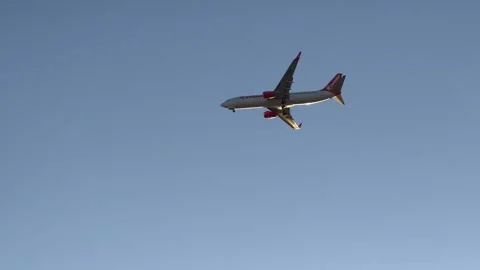Plane in blue sky Stock Footage 337235203