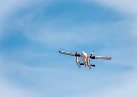 The plane in the blue sky Stock Photos