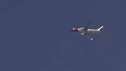 Plane building cloud sky flying aircraft airship transportation wings close Stock Footage 318225708