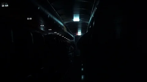 Plane cabin interior light off night flight Stock Footage 109554525
