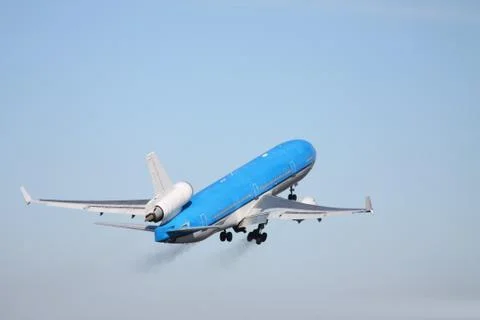 Plane in a clear blue sky Foto stock