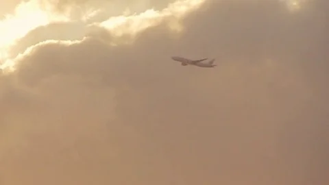 Plane In the Clouds Stock Footage 73908697