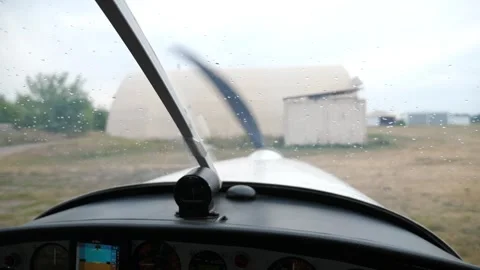 Plane cockpit view showcasing propeller motion as aircraft prepares for takeoff Stockbeeldmateriaal 345836698
