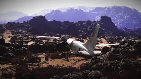 Plane crash site in rugged terrain surrounded by rocky mountains Stock Footage 317171969