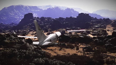 Plane crash site in rugged terrain showcasing wreckage amidst rocky landscape Stock Footage 321737394