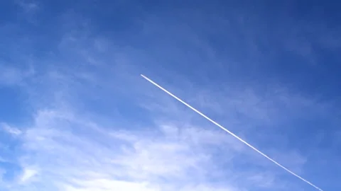 Plane is crossing blue sky. Video stock 147749380