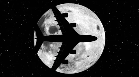A plane crossing the face of the moon Stock Footage 40724049