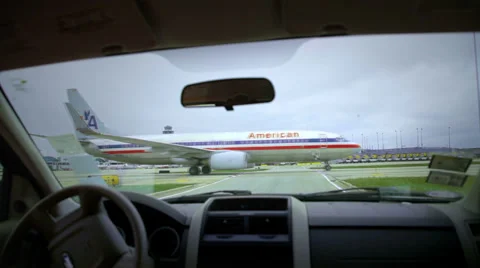 Plane Crossing - Shot from Inside Car - On Runway Stock Footage 33446169