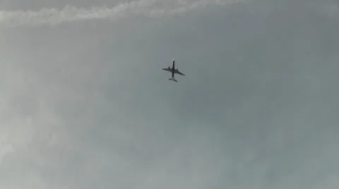 Plane curves in the sky Stock Footage 24802181