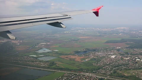Plane descends over the city Video stock 165830105