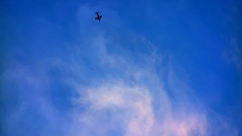 Plane Dives Down Through the Frame 動画素材 107559857