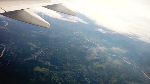 Plane doing round waiting landing autorization and then landing in an airport  Stock Footage 100077306