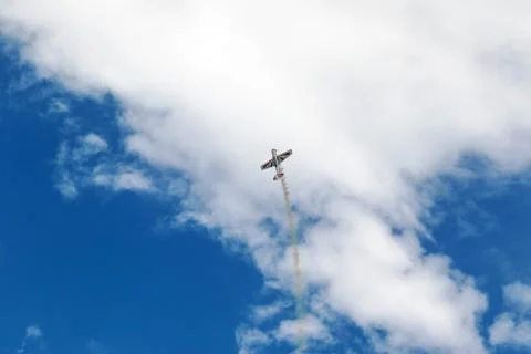 Plane doing tricks in the sky Stock Photos