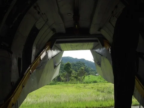 Plane Door Closing Behind the Amazon Jungle Rainforest Stock Footage 112937225