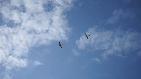 Plane dragging the glider.  Self propelled glider in air. Stock-Footage 123606534