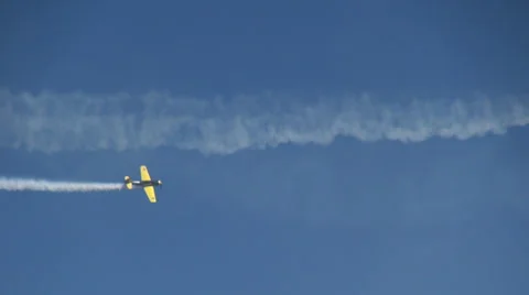 Plane drawing on a blue sky, air show, aircraft trail, adrenaline Stock Footage 39750166