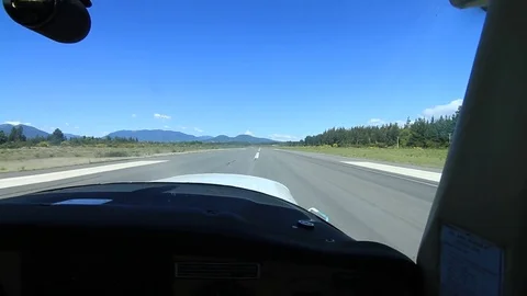 Plane driving down runway Stock Footage 77052901