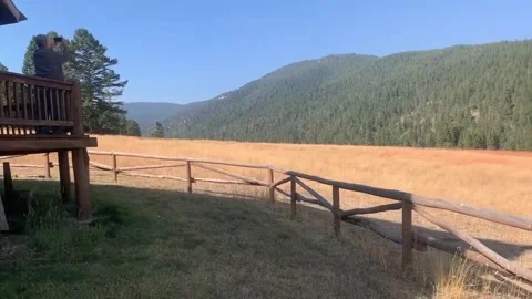 Plane Drops Fire Retardant to Save Cabin, Middle Fork, Montana, USA - 04 Oct 202 Video stock 205327051