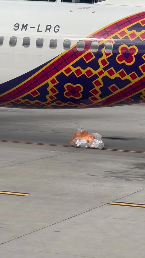 Plane Dumps Garbage, Kuala-Lumpur, Malaysia - 15 Feb 2024 Stock Footage 301907033
