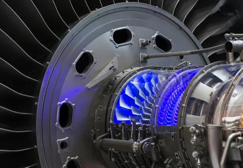 Plane engine element. Turbine blades. Blue light Stock Photos
