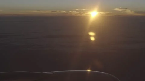 Plane Engine Flying at Sunset Stock Footage 167747788