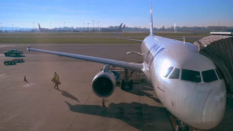 Plane engineer inspector checks plane, wing, engine, Lisbon airport. Stock Footage 110816928