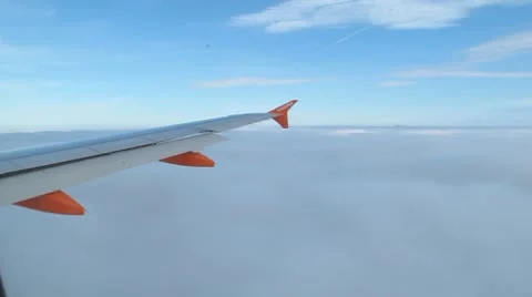 Plane entering clouds Stock Footage 10735474