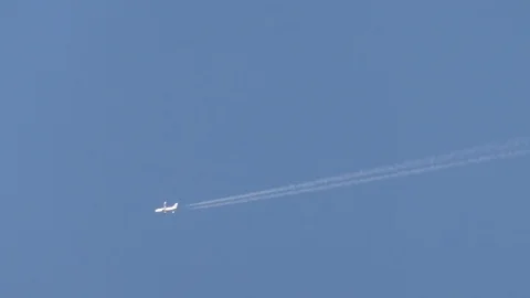 Plane in the evening sky with Stock Footage 106668433