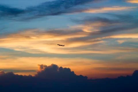 Plane with the evening sky Stock Photos