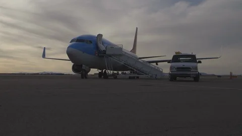 Plane With Exit Stairs on Runway Stock-Footage 117054875