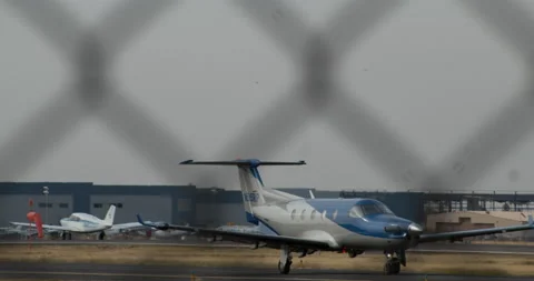 Plane by fence Stock Footage 166648947