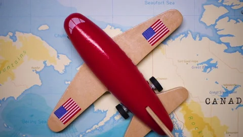 A plane with a flag of Alaska crossing the map. Stock Footage 143983170