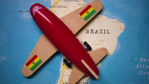 A plane with a flag of Bolivia crossing the map. Stock Footage 143980858