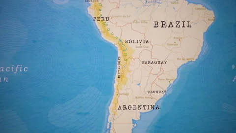 A plane with a flag of Chile crossing the map. Stock Footage 143981076