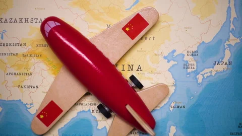 A plane with a flag of China crossing the map. Stock Footage 143981120