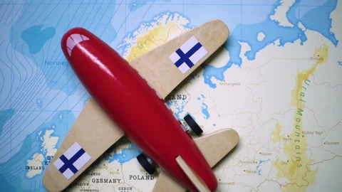 A plane with a flag of Finland crossing the map. Stock Footage 143983478