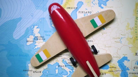 A plane with a flag of Ireland crossing the map. Stock Footage 143983528
