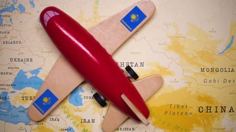 A plane with a flag of Kazakhstan crossing the map. Stock Footage 143982019