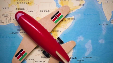 A plane with a flag of Kenya crossing the map. Stock Footage 143982003