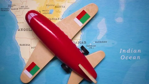 A plane with a flag of Madagascar crossing the map. Stock Footage 143982170